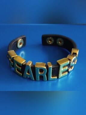 BCB Generation Fearless Bracelet Gold Tone Letters Black Button Strap